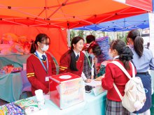 Visitors and students enthusiastically participating in the game booth activities