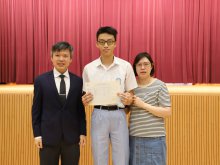 Principal Mr. HO Chun-yan (left) congratulating Lee Waai-ngoi and his parent