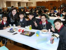 Principal Dr. POON Suk-han, Halina, MH, (L2), and students participating in Gospel Lunch