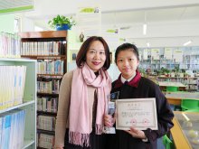 Instructing teacher Ms. CHAU Ka-yu (left) and Senior Secondary Category Second Class Award recipient 5S YEUNG Pui-ying (right)